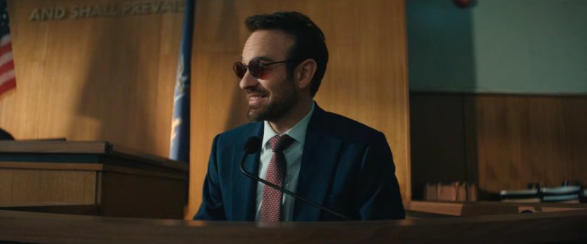 Matt on the witness stand in courtroom.