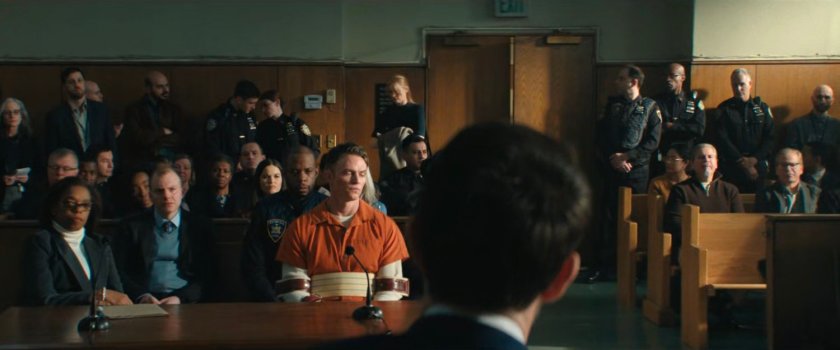 Bullseye in courtroom with onlookers.