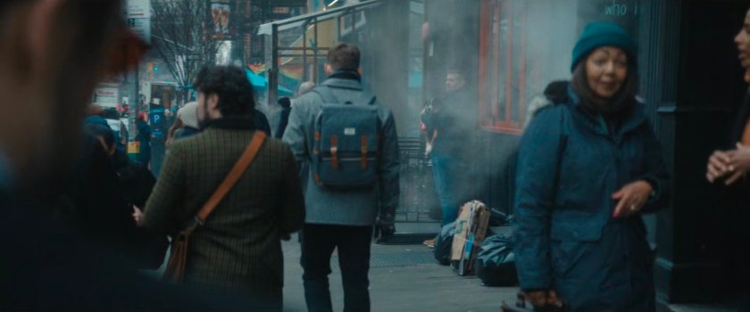 Matt focusing on people along sidewalk.