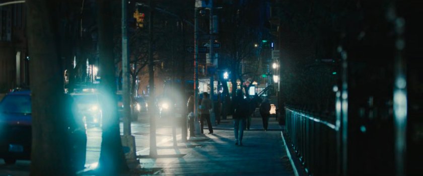 Interstitial: nighttime sidewalk.