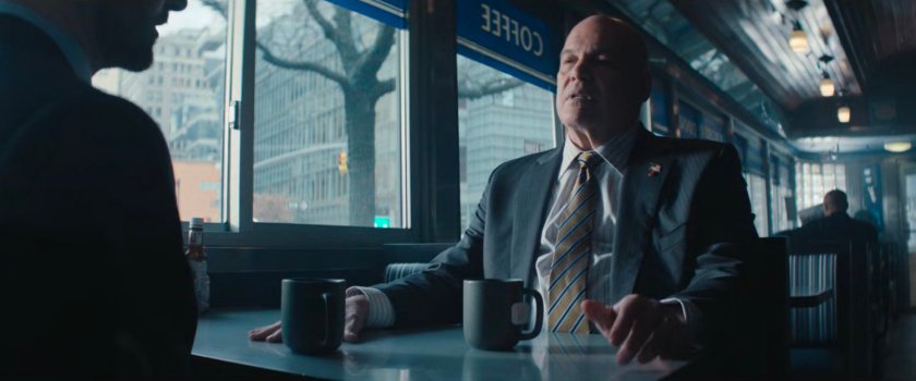 Matt and Fisk in a diner.