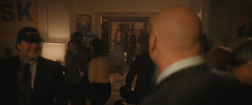 Fisk celebrates his win staring across room at Vanessa.