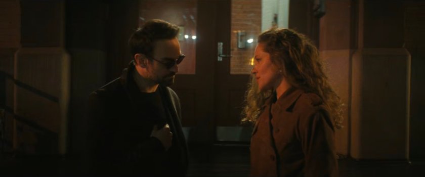 Matt and Heather on sidewalk outside her apartment.