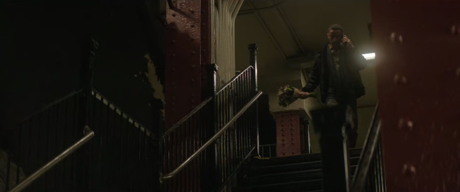 Hector Ayala walking down stairs in 168 Subway Station.