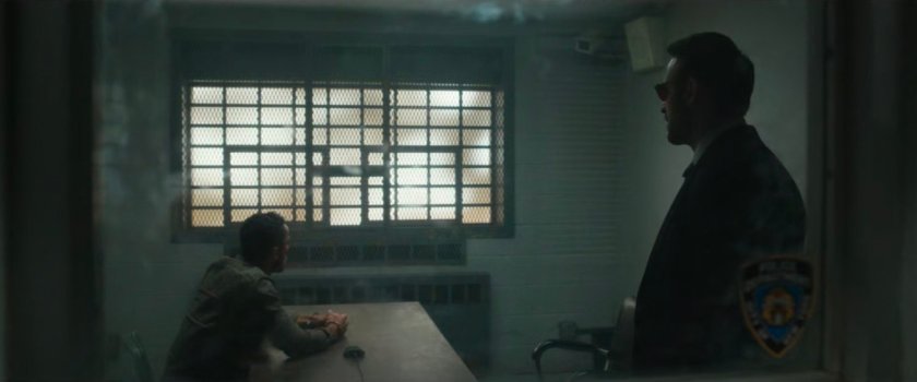 Matt in the interrogation room with Hector Ayala at the 15th Precinct Police Station.
