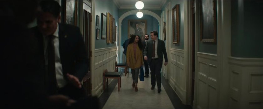 BB Urich and Daniel Blake in a hallway of City Hall.