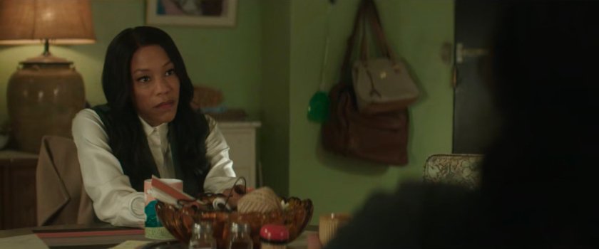 Soledad Ayala in her kitchen talking to Kirsten.