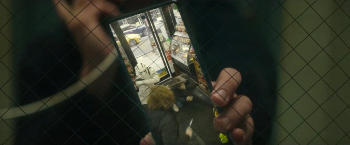 Video footage of White Tiger beating up robbers in a bodega.