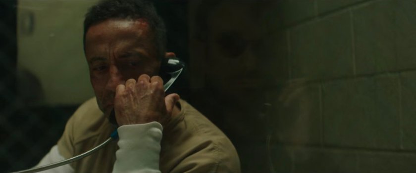 Hector Ayala in the visitation cell at Ryker's Island Penitentiary.