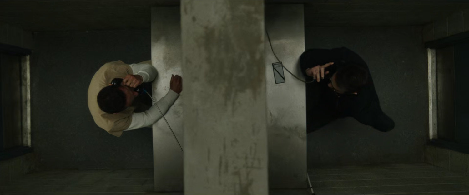 Hector Ayala and Matt in the visitation cell at Ryker's Island Penitentiary.