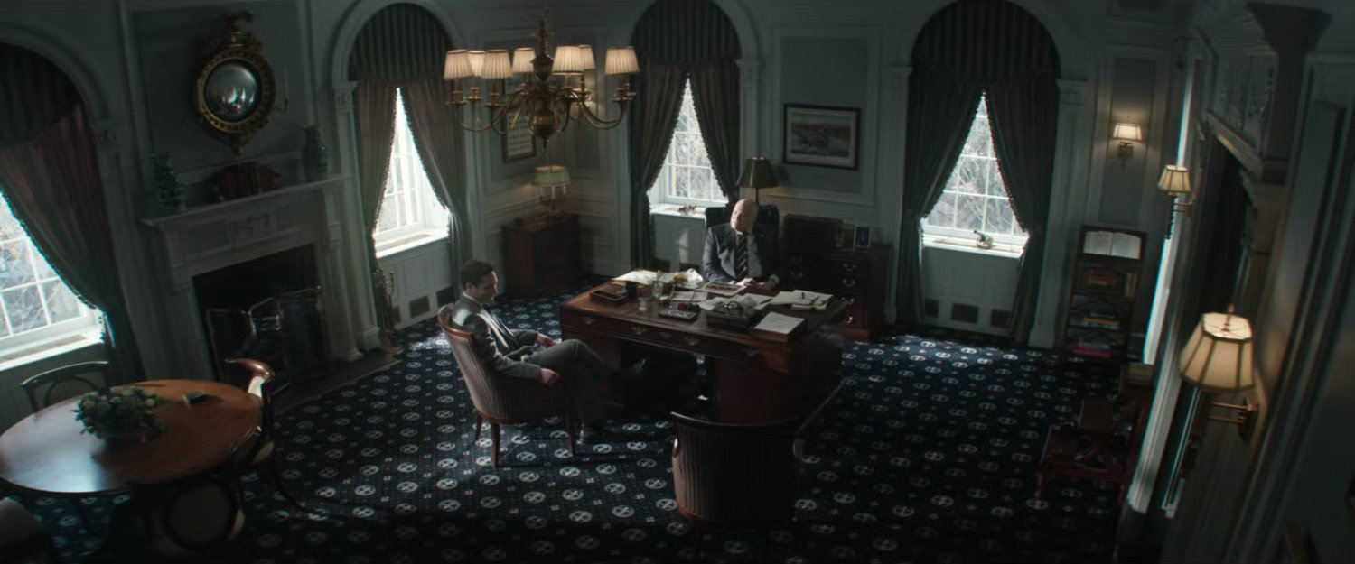 Fisk and Buck sitting in the Mayor's office at City Hall.