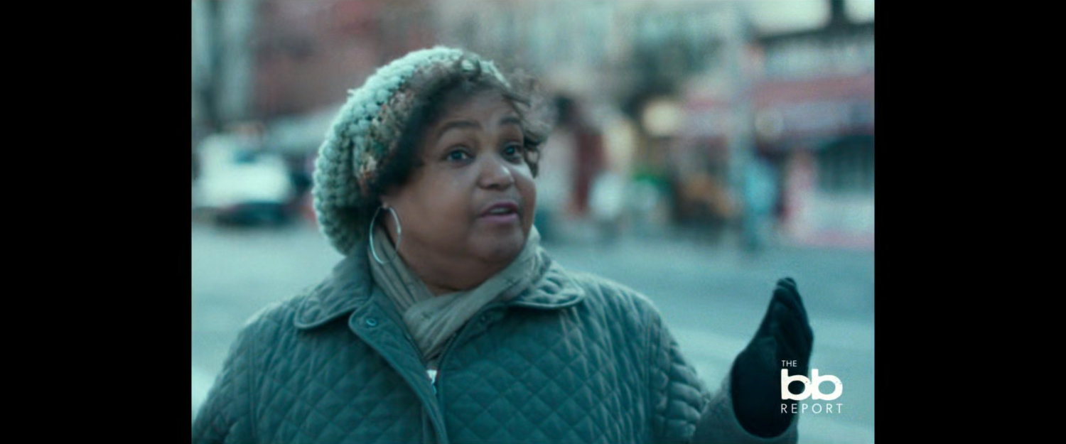BB Report: woman on street.