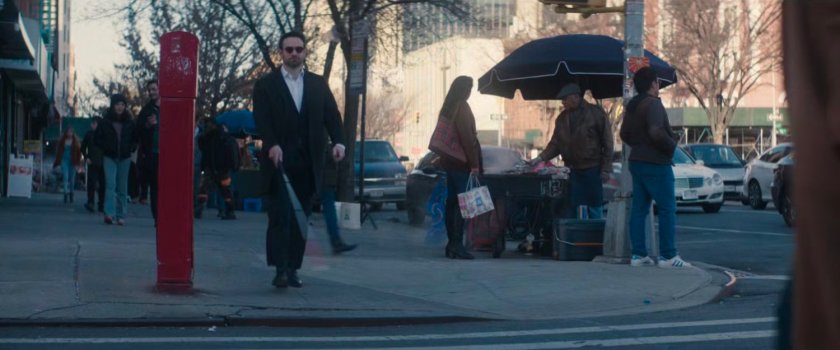 Matt approaching a street corner near Powell's apartment.