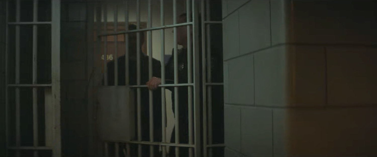 Matt enters a holding cell at the courthouse.
