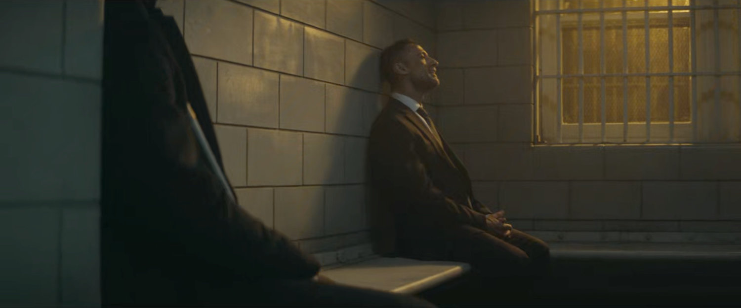 Matt in a holding cell at the courthouse with Hector.
