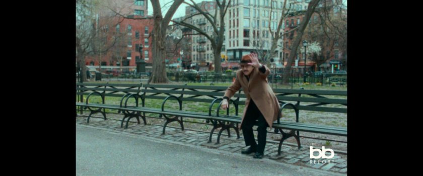 BB Report: man interviewed on park bench.