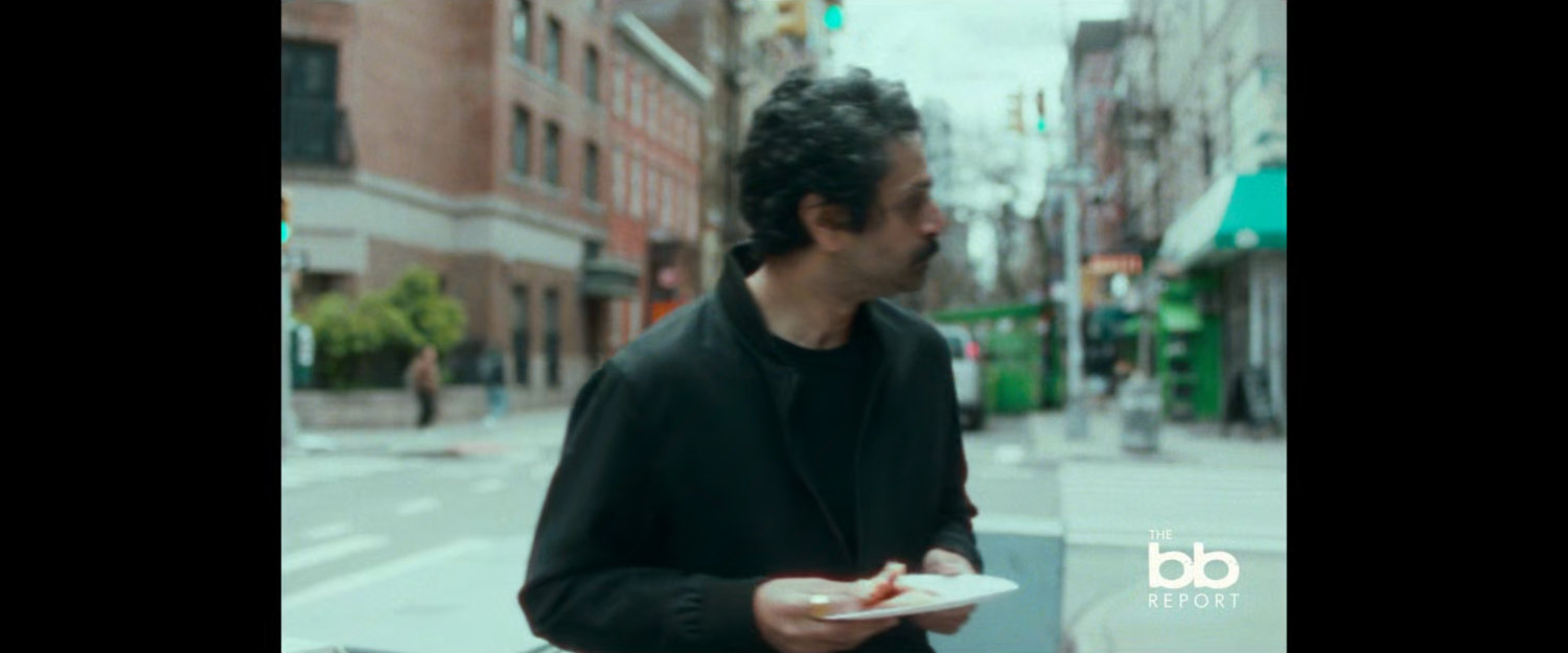 BB Report: man with pizza.