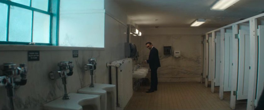 Matt in the bathroom of the courthouse.