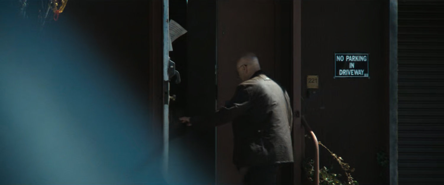 Cherry enters a warehouse.