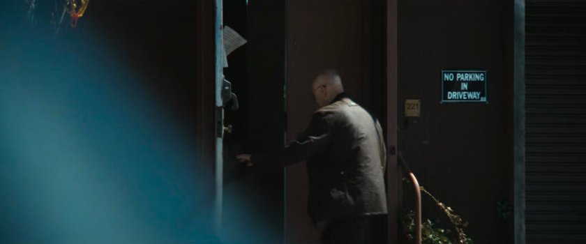 Cherry enters a warehouse.