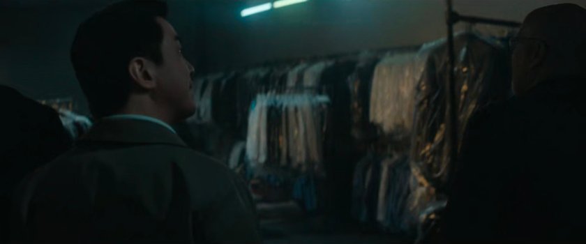 Forest Tam inside warehouse/safe house.