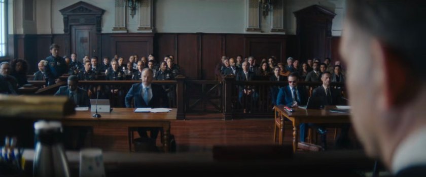 The court filled with police and onlookers.
