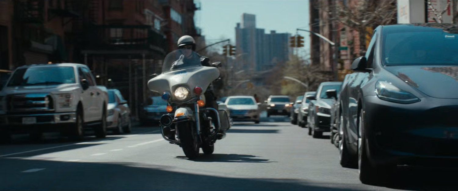 Motorcycle officer on street.