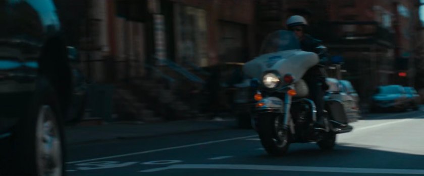 Motorcycle officer on street.