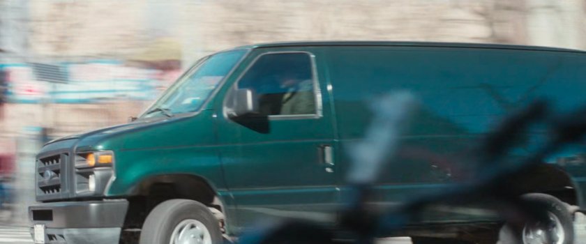 Van speeding around corner.