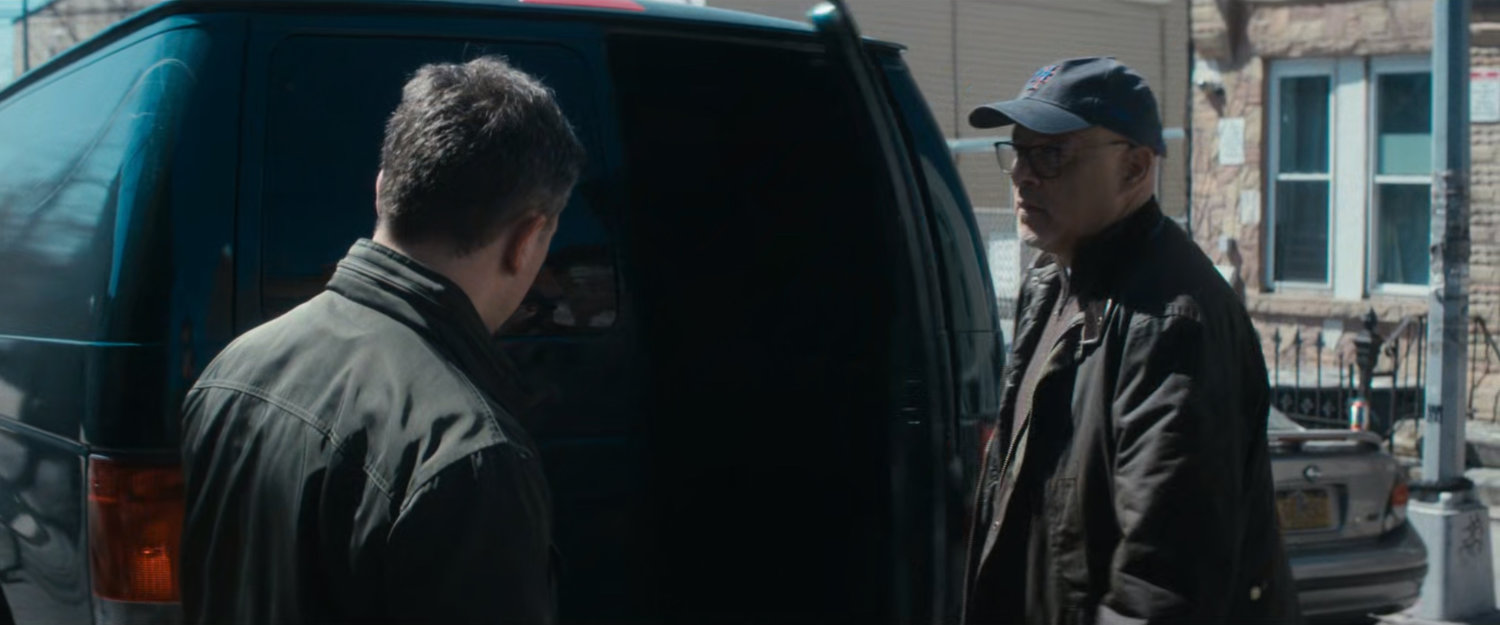 Officer Powell and Cherry looking in back of van.