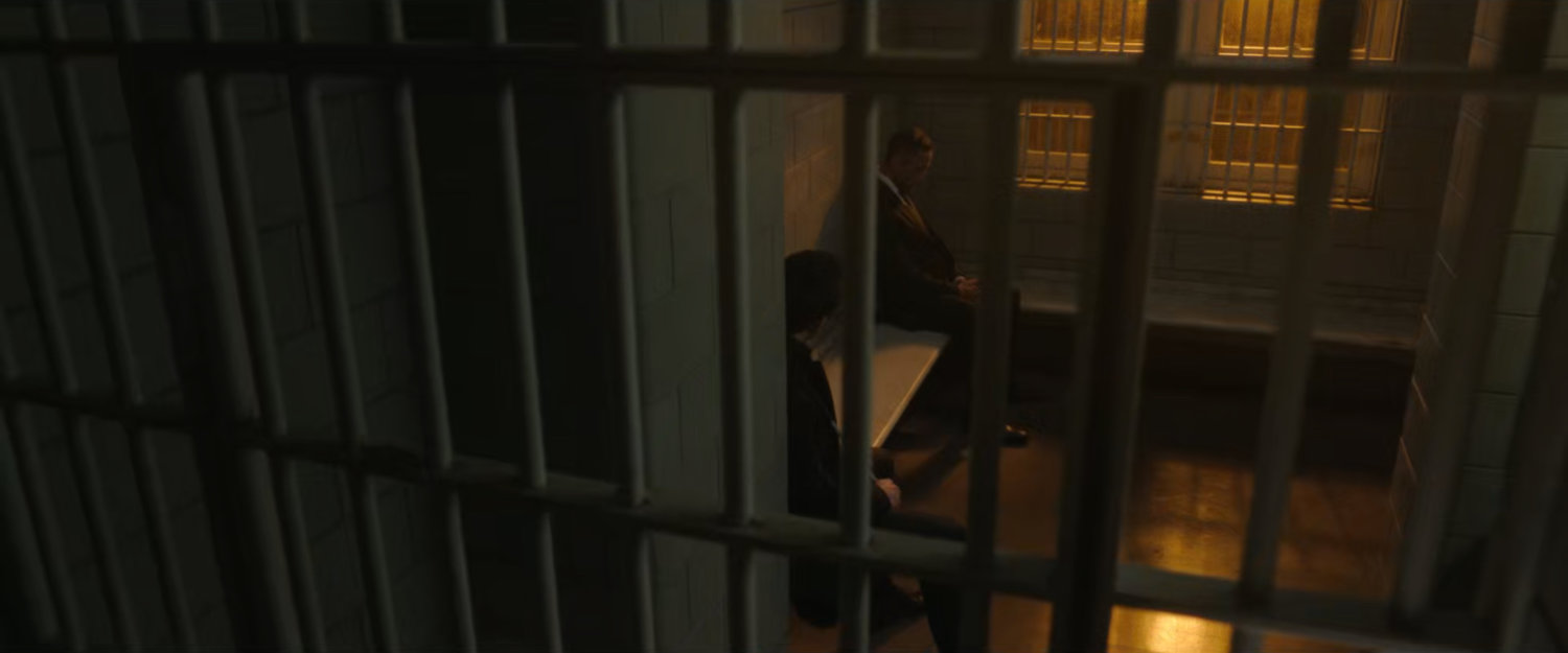 Matt in a holding cell at the courthouse with Hector.