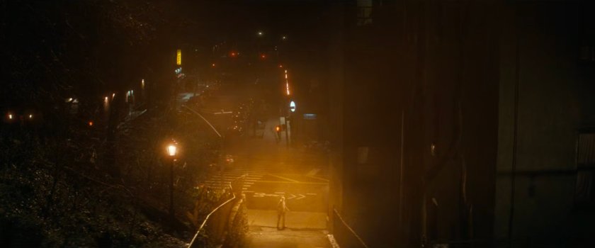 White Tiger at the bottom of a foggy alley.