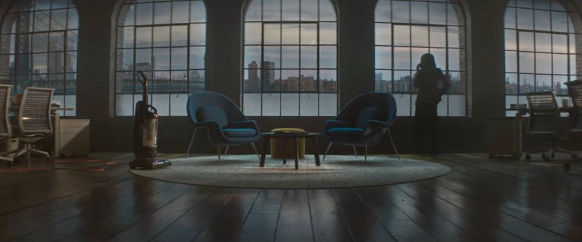 Kirsten on the phone inside Murdock and McDuffie.