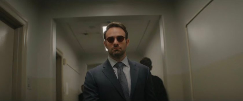 Matt walking through the hallway at the 15th Precinct.