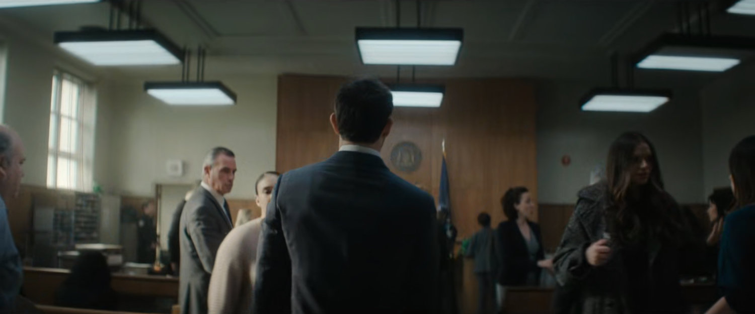 Matt enters the city courtroom.