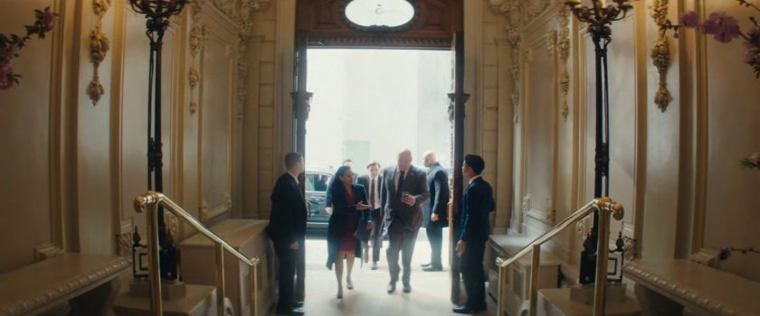 Fisk and team enter Latvian Cultural Center.