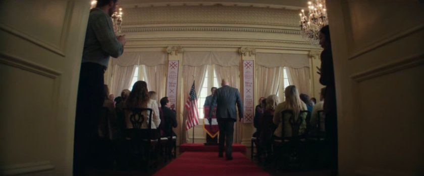 Fisk enters reception in Latvian Cultural Center.