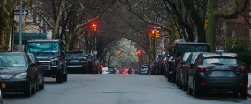 Interstitial: deep focus shot along street.