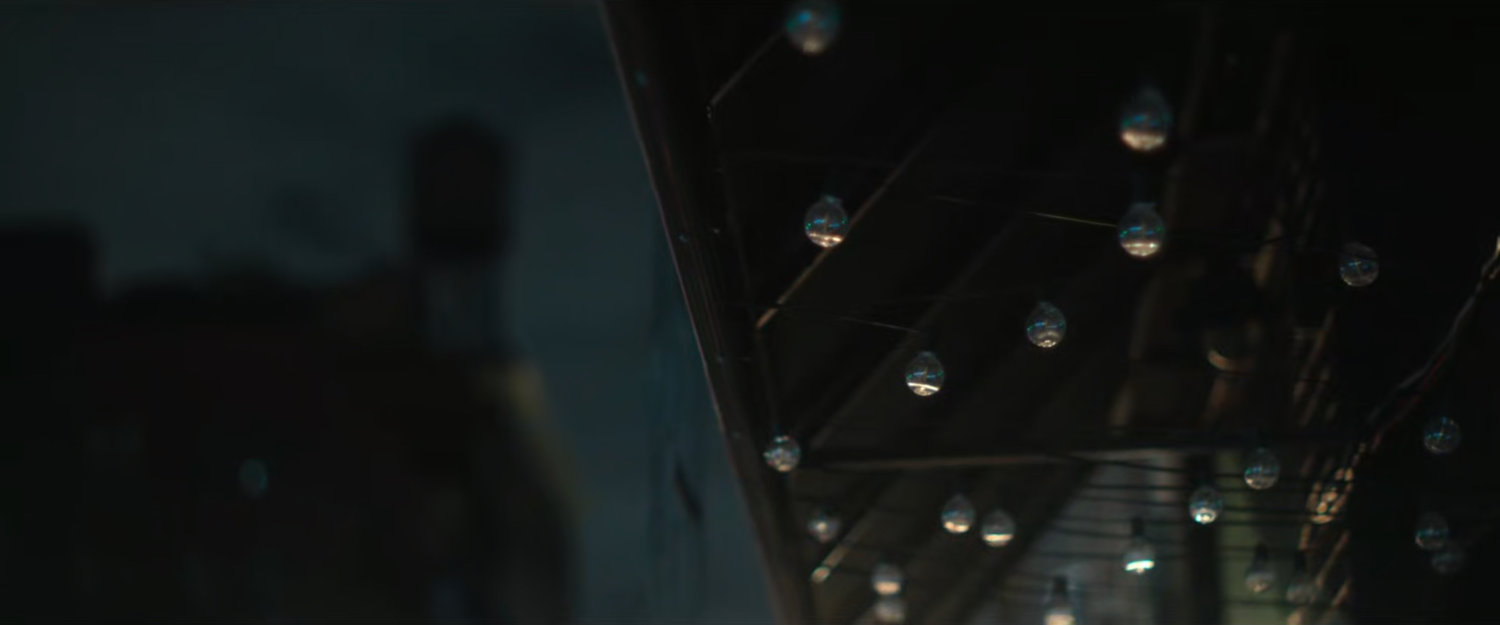 Interstitial: underside of awning with light bulbs.