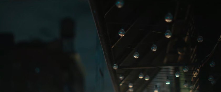 Interstitial: underside of awning with light bulbs.