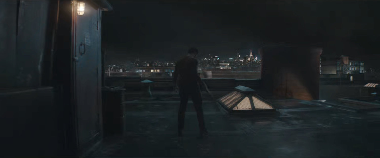 Matt on his rooftop at night, training.