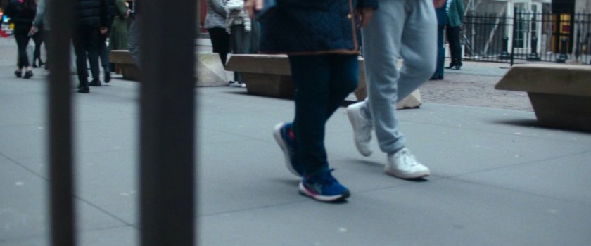 Interstitial: feet on a sidewalk.