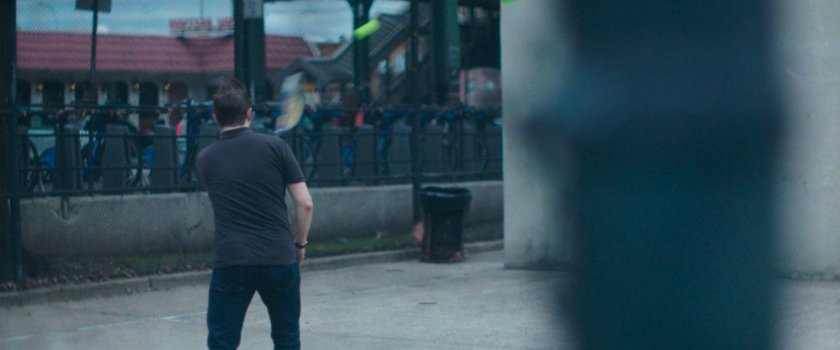 Interstitial: man playing pickleball.