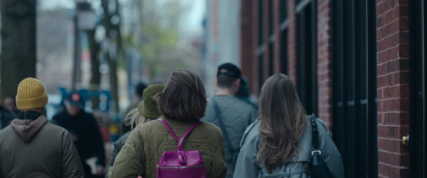Interstitial: people on sidewalk.