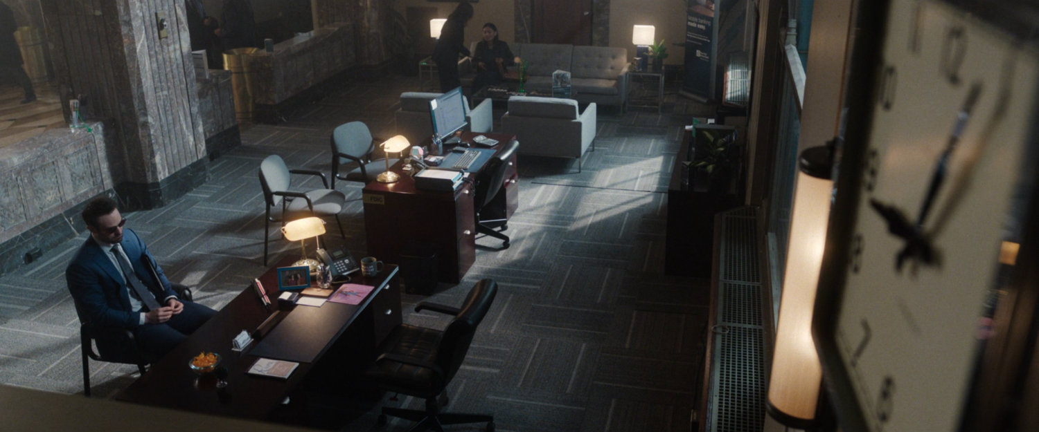 Matt sitting in New York Mutual Bank.