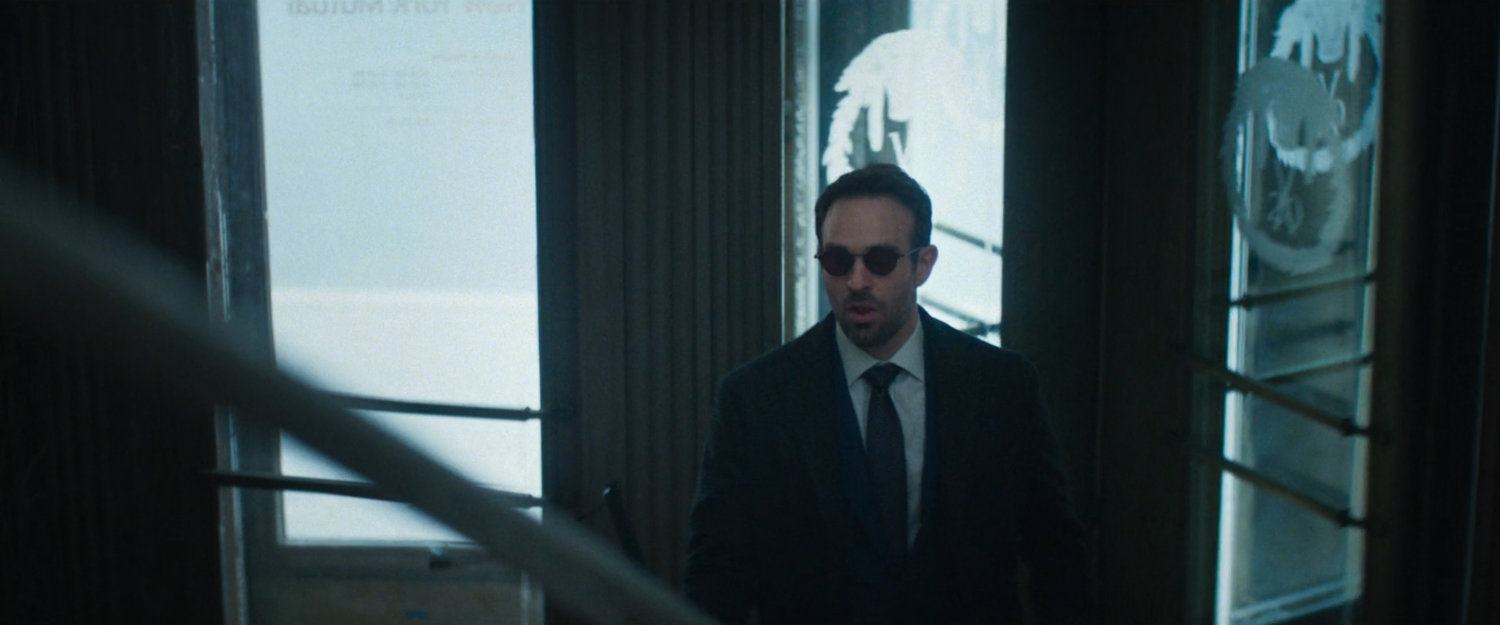Matt entering New York Mutual Bank.