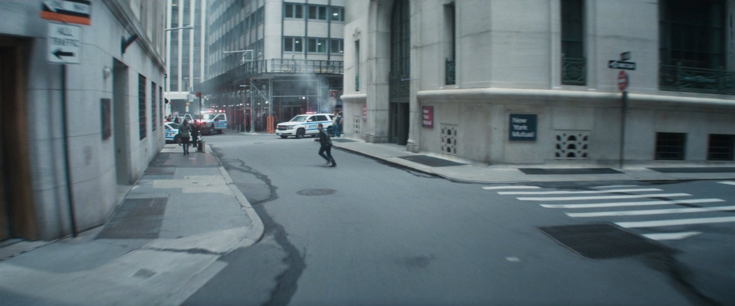 Police vehicles arriving outside New York Mutual Bank.