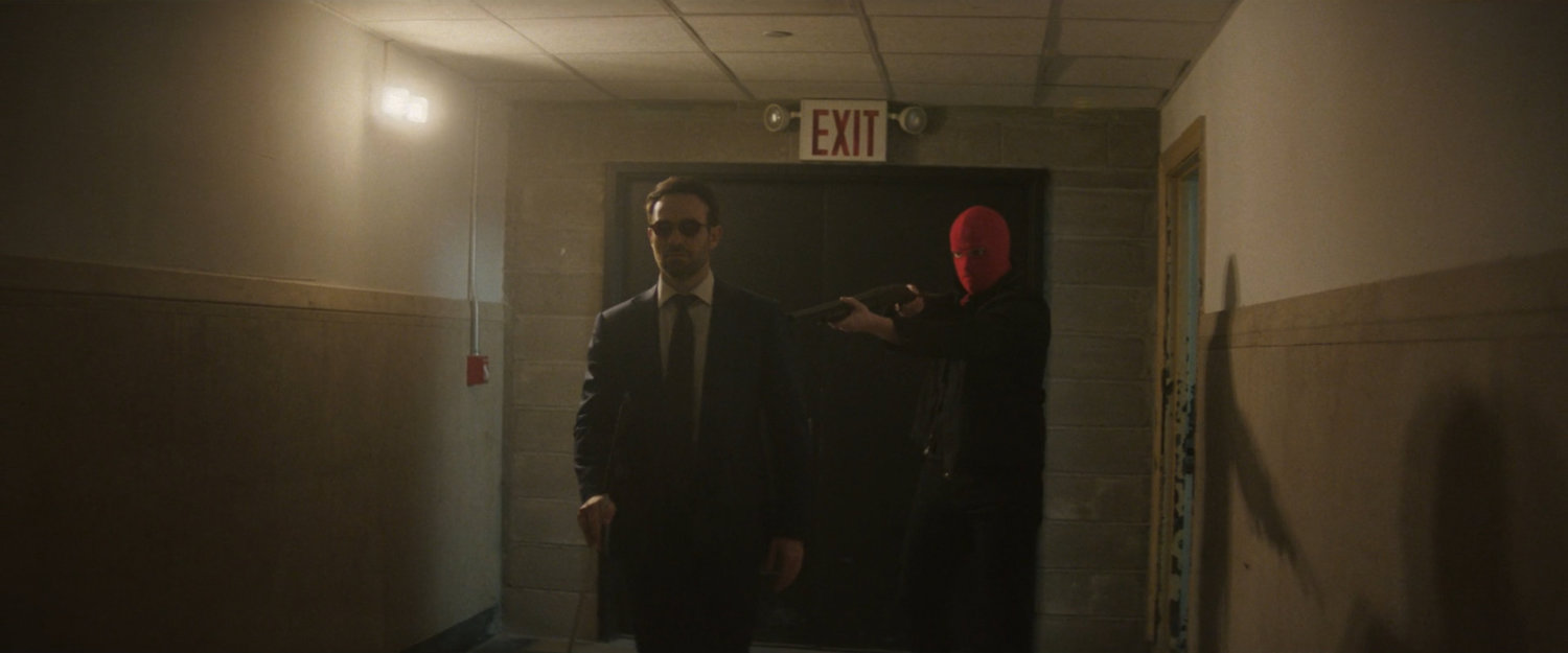 Matt and Robber in hallway of New York Mutual Bank.