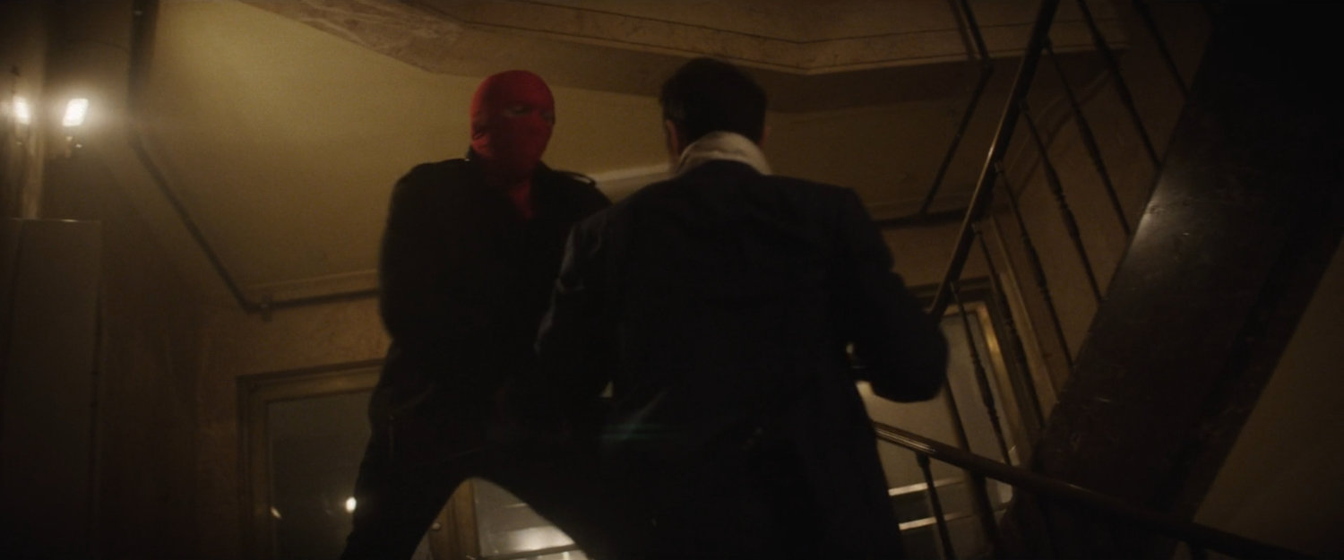 Matt and Robber in stairway of New York Mutual Bank.