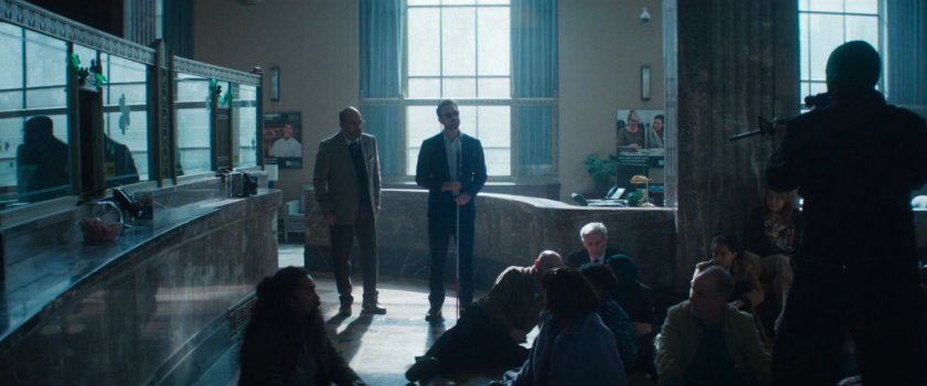 Matt and Yusuf talking to robbers in New York Mutual Bank.